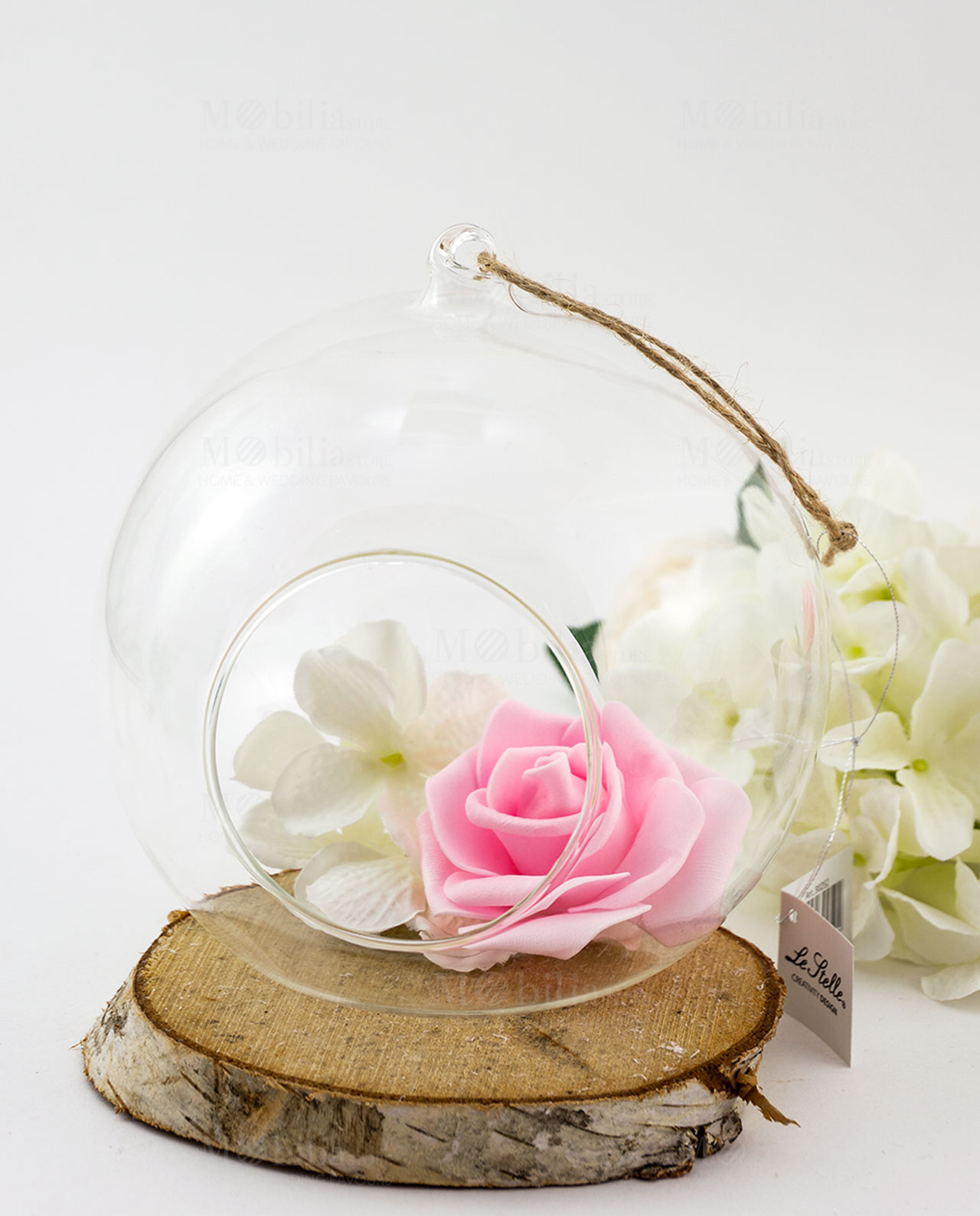 bolla vetro con fiori bianchi e rosa e cordoncino