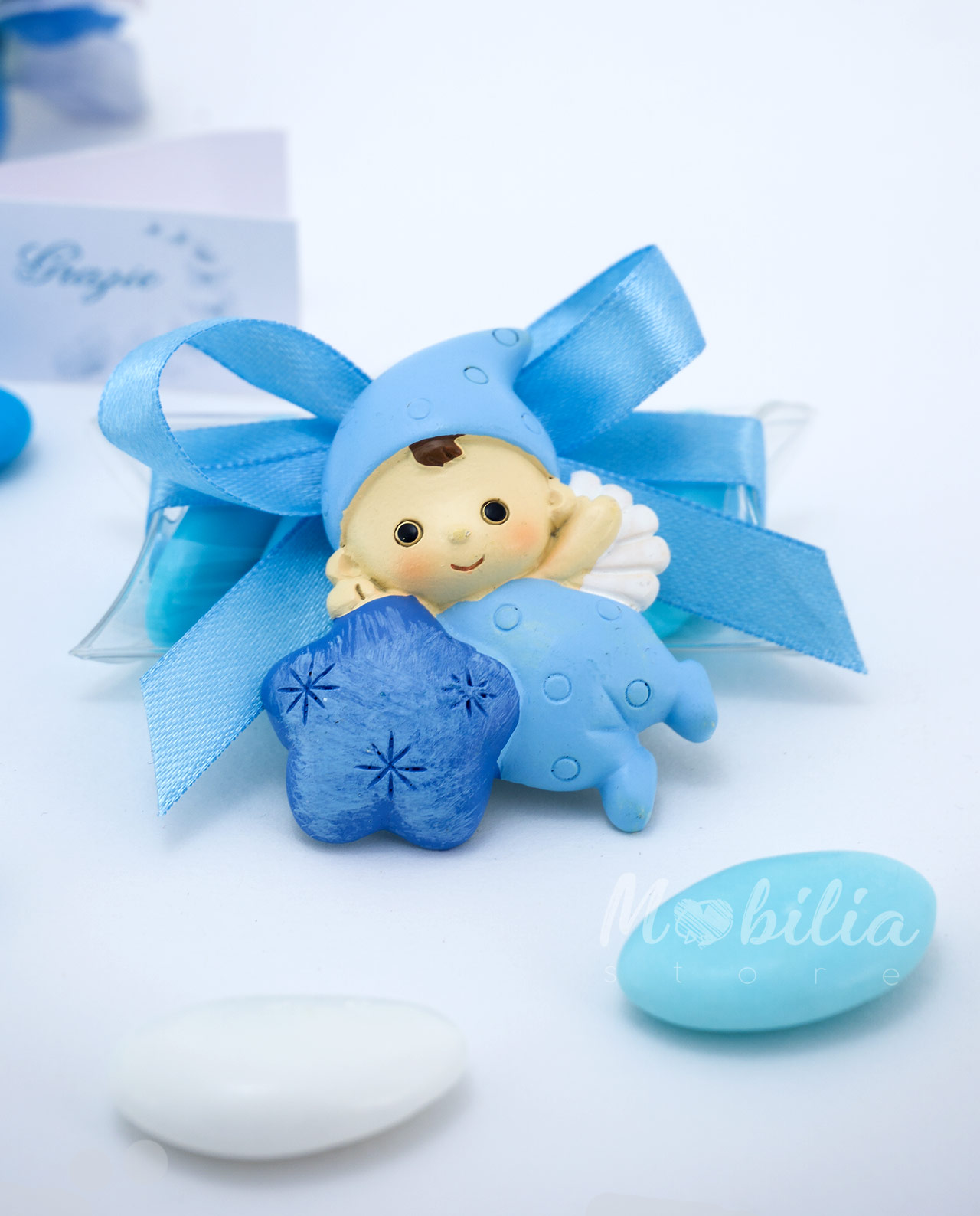Magnete baby angelino blu assortito su tubicino