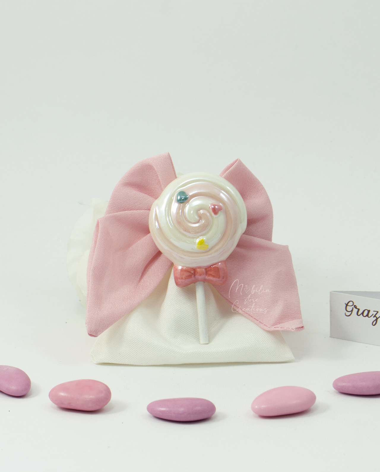 Bomboniera magnete lollipop rosa su sacchetto