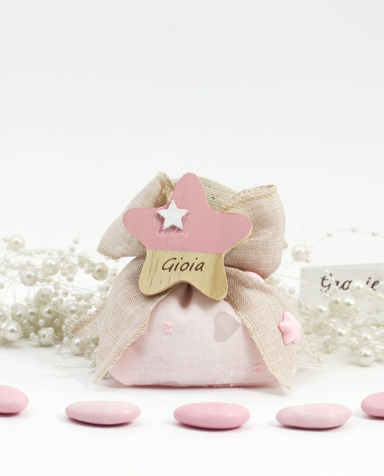 Sacchetto con Magnete stella legno rosa assortita