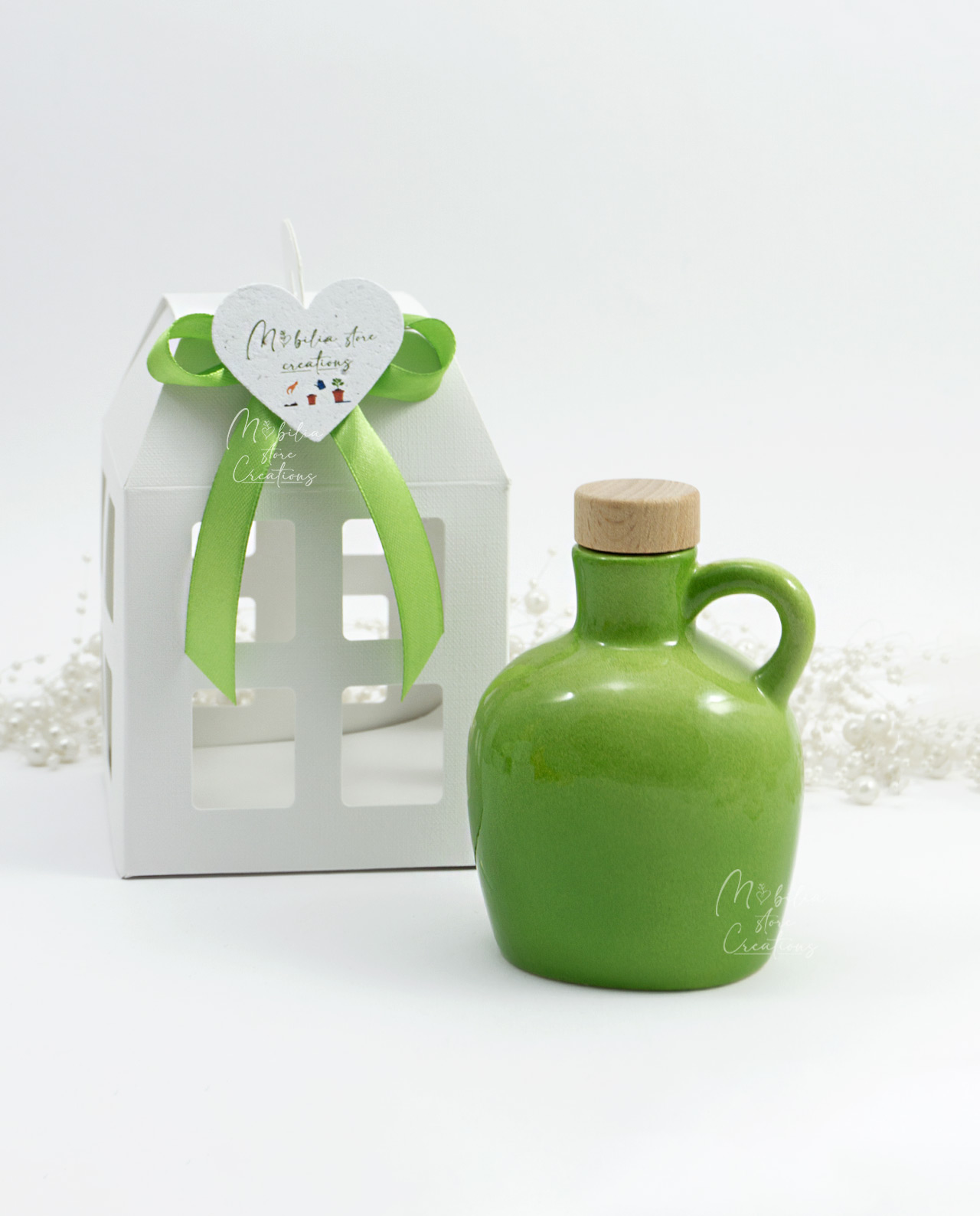 Oliera in ceramica colorata assortita con lanterna e fiocco