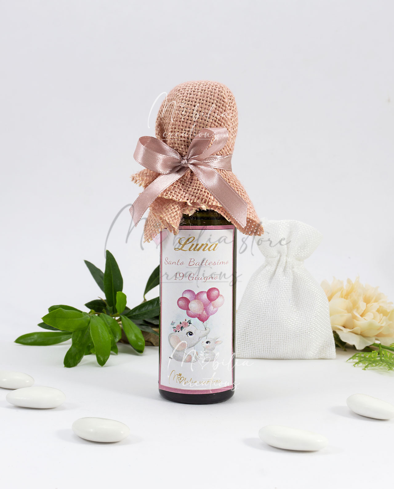 Bomboniera bottiglia di olio evo italiano personalizzabile da 100 ml con copri tappo in juta rosa