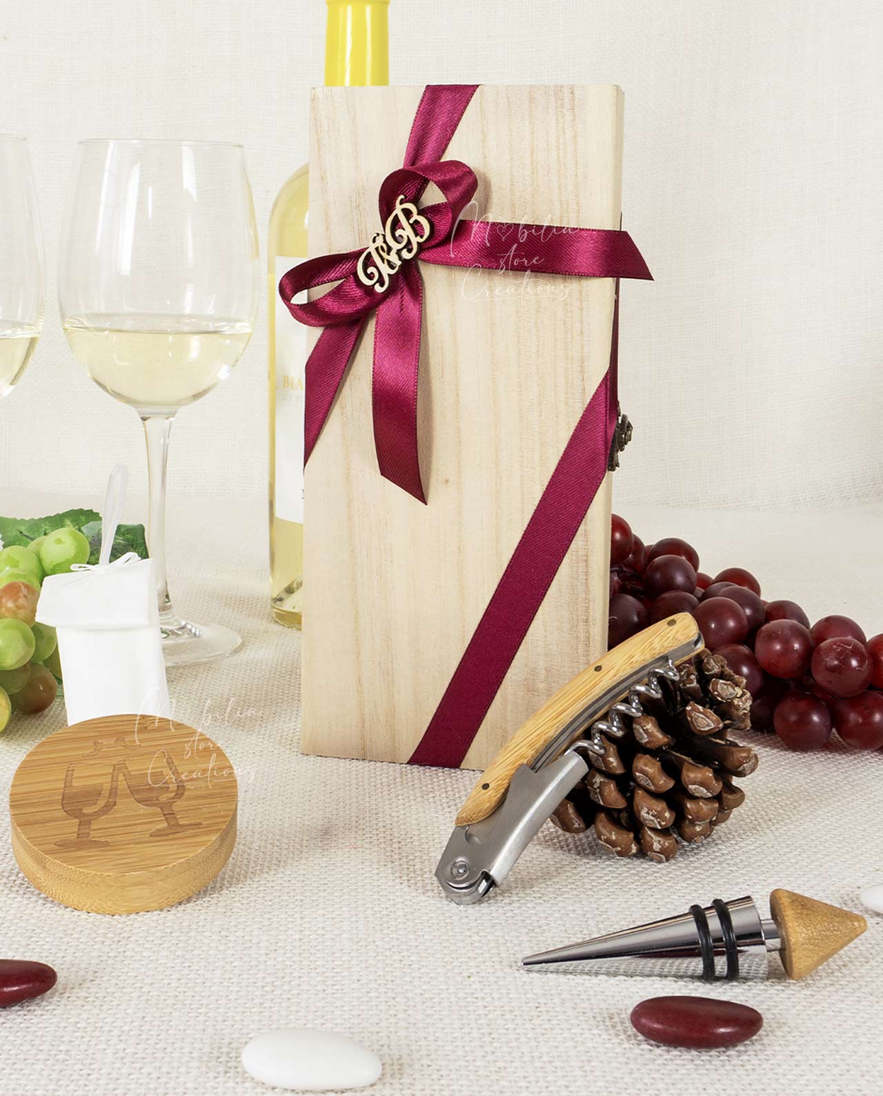 Bomboniera set accessori vino in legno e metallo con confetti