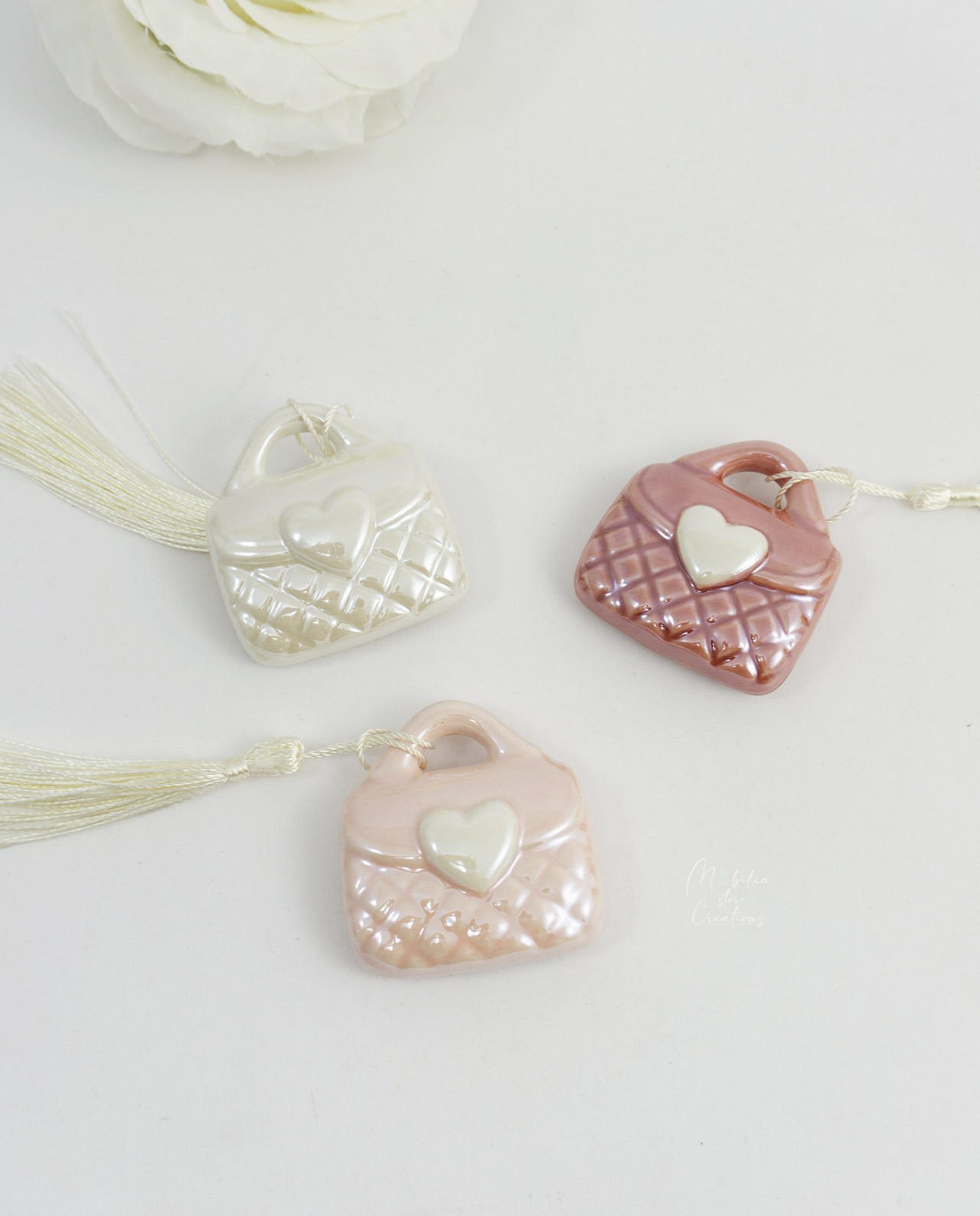 Magnete borsetta colorata con nappina
