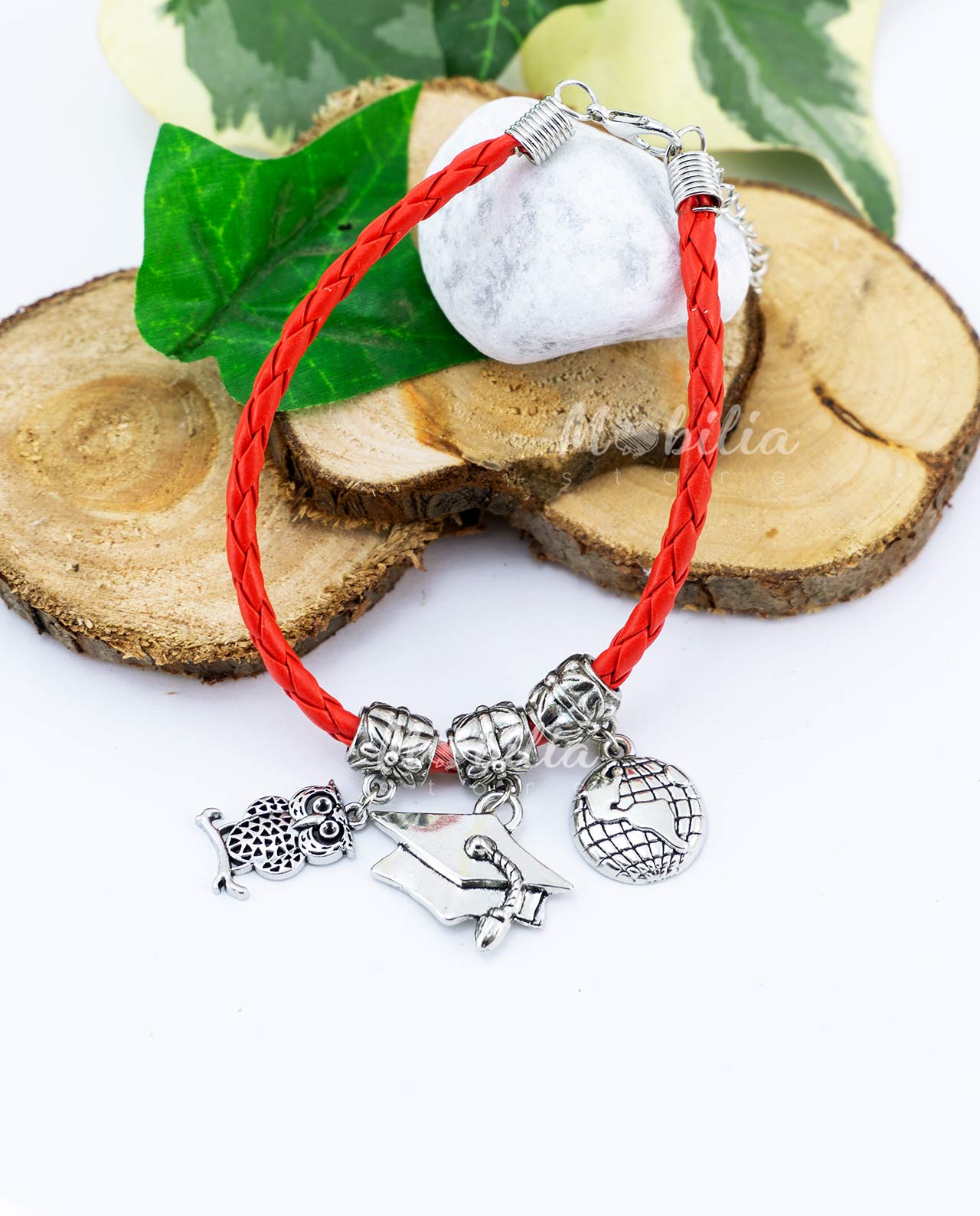 Bracciale in similpelle intrecciata con ciondoli laurea