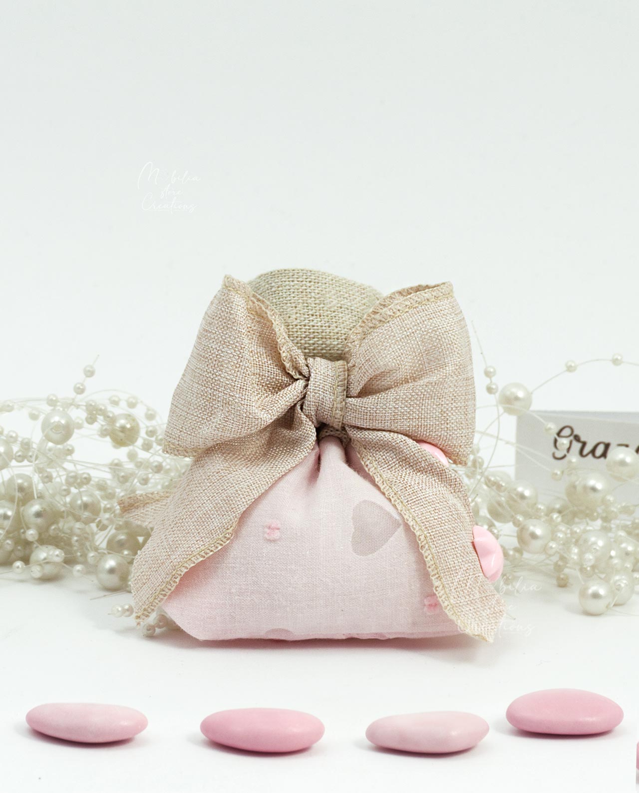 Sacchetto rosa con stelline e confetti