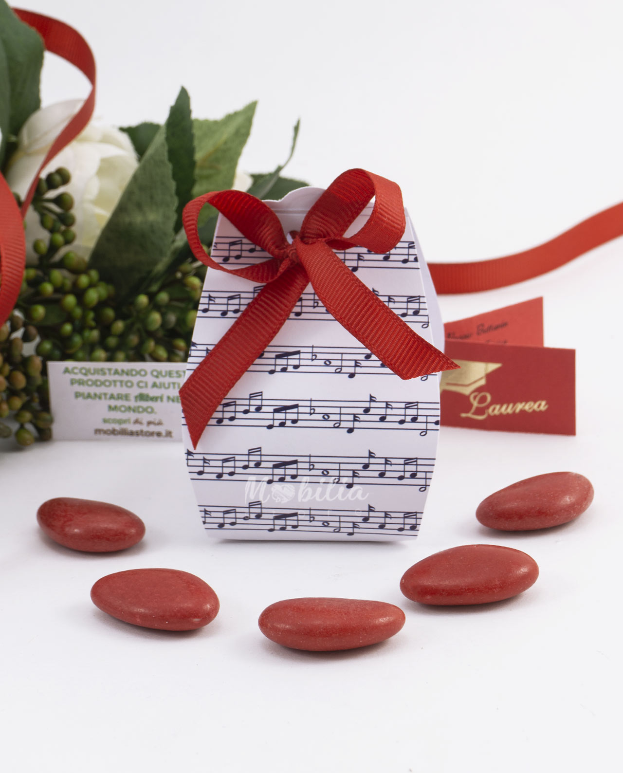 Scatola sacchetto con spartito musicale blu e confetti
