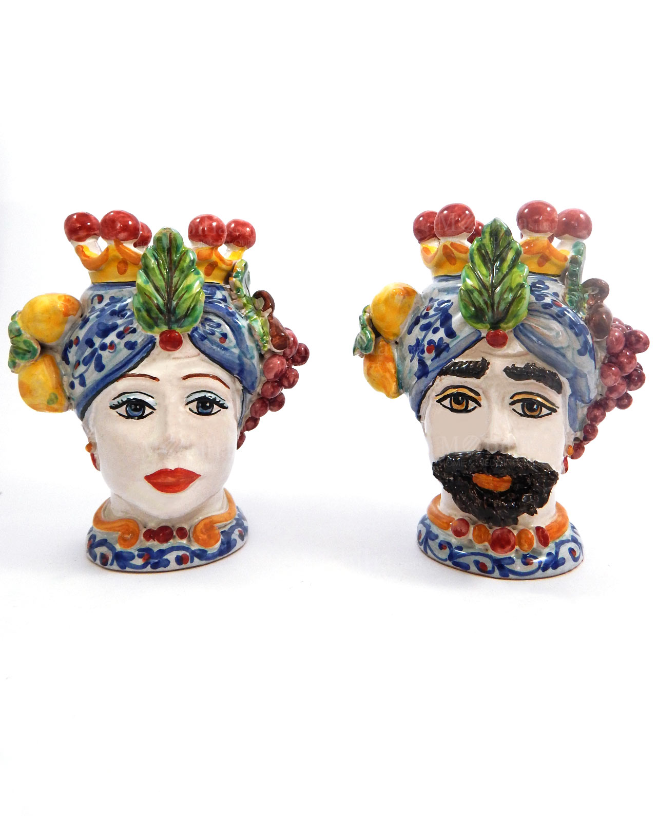teste di moro re e regina con uva e limoni colorati ceramica di caltagirone